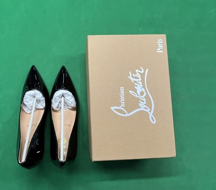 Midnight Black Pumps — Iconic Red Sole